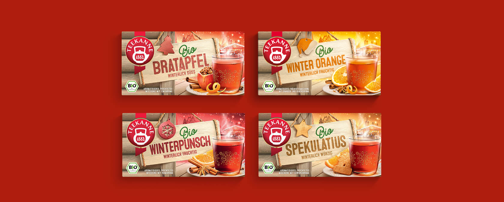 Bio Wintertees vor rotem Hintergrund