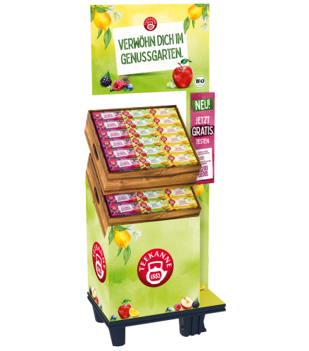 Teekanne Teedisplay mit verschiedenen Schachteln und Fruchtbildern.