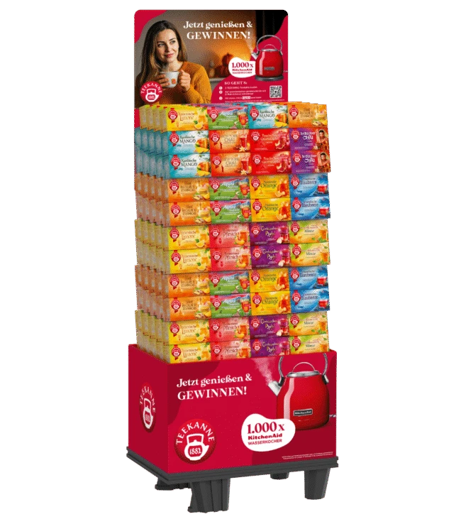 Teekanne Teedosen auf Supermarktständer, darüber Schild mit lächelnder Frau, Teekanne, deutsche Gewinnspielwerbung.