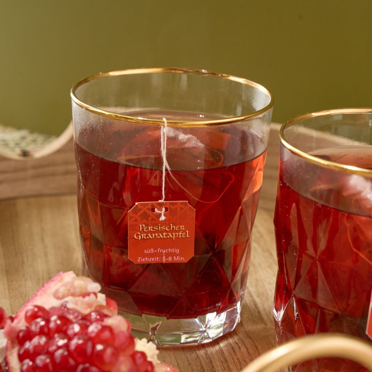 Granatapfel-Tee in Glas
